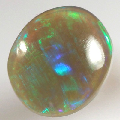 SOLID SEMI BLACK OPAL Large rolling flash of tropical green and blue